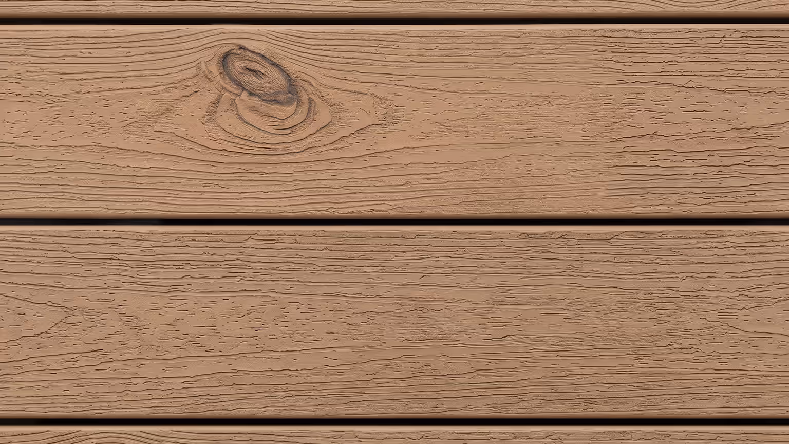 Tan uncapped composite deck boards with a moulded woodgrain surface and repeating knot pattern